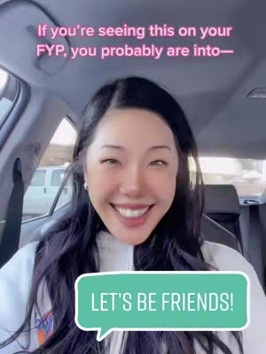 A smiling woman with long dark hair is sitting in the driver's seat of a car. Text overlays say, "If you're seeing this on your FYP, you probably are into..." and "LET'S BE FRIENDS!" The woman is wearing a white hoodie. The background shows a bright sky and trees.