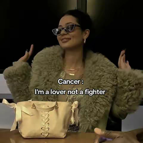 A woman is in the foreground wearing sunglasses and a furry coat. She has a beige bag, which is on the table in front of her. The hook is text overlaid on the image, and is a quote. The background is dark, partially visible.