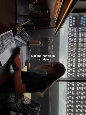 The cover image is a vertical shot showing a person at a desk, with a laptop on the left and a window to the right displaying outside scenery. The person is holding a pen and a paper, seemingly studying.