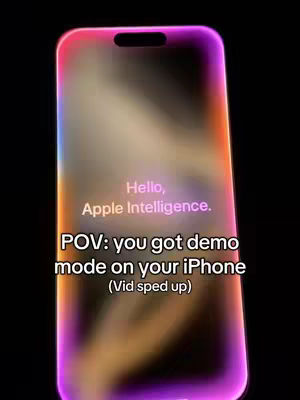 The cover image displays a stylized, glowing silhouette of an iPhone on a black background. On the phone’s screen, text reads 'Hello, Apple Intelligence.' Below this, a text overlay states, “POV: you got demo mode on your iPhone (Vid sped up)'