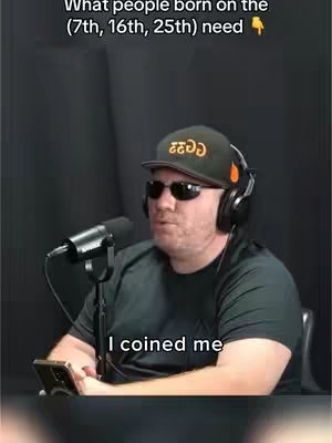 A man wearing sunglasses, a black cap with white text, and headphones is in what appears to be a recording studio setting. A microphone is placed in front of his face, and he's holding a phone. Text overlays at the top and bottom of the image.