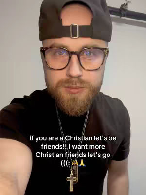 A close-up shot of a man with glasses, a beard, and a backwards baseball cap. He is looking directly at the camera, with text overlayed at the bottom promoting Christian fellowship.