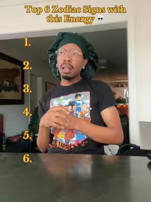 The cover image shows a person in front of what seems to be a window and a table. They appear to be in a room or home. This person is wearing a green head cover, glasses, and a black t-shirt. The text overlay reads: "Top 6 Zodiac Signs with this Energy". Also, a list of numbers from 1 to 6 is present to the left of the person.