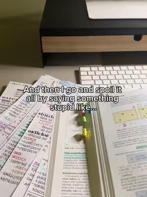 The image shows study notes and a book with a desk and keyboard in the background. The notes are handwritten and detailed with colors. The hook text is overlaid at the top of the frame.