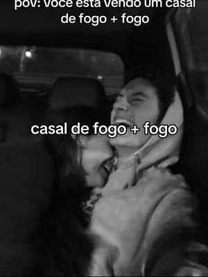 A black and white image of a couple embracing inside a car. The man is smiling and looking to the right, while the woman is leaning in to kiss him. There is text overlaid on the image.