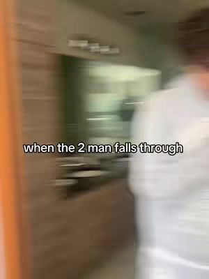 The cover image is a blurry, motion-filled shot that appears to be taken indoors, likely in a home or office environment. The central focus is a blurred figure, suggesting movement. Overlaid on the image is white text, providing a hook for the video. The background is indistinct, composed of neutral tones and blurred architectural features.