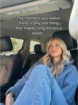 The cover image shows a young woman sitting in the front seat of a car. She has long blonde hair, is wearing a blue hoodie and light blue jeans, and is looking off to the side with a pensive expression. The car interior is visible with black seats and headrests.