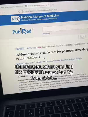 A laptop screen displaying a PubMed page about evidence-based risk factors for postoperative deep vein thrombosis, with overlay text. The laptop is on a table and the keyboard is visible.