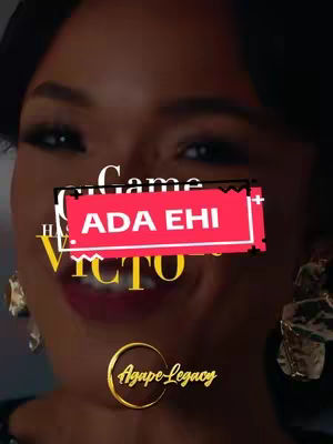 The image is a close-up of a woman's face, with a red rectangular text overlay reading \"ADA EHI\". The background is slightly blurred, suggesting a close-up shot.