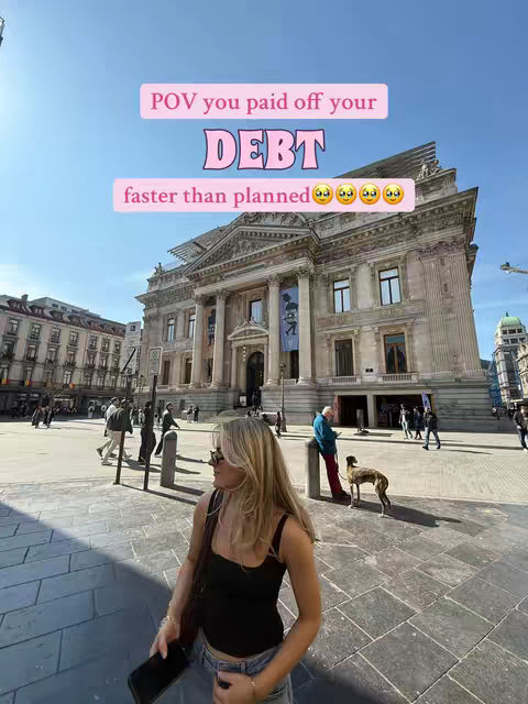 A woman stands in front of a large building with columns. Text overlays on the image say 'POV you paid off your DEBT faster than planned' with happy emojis.