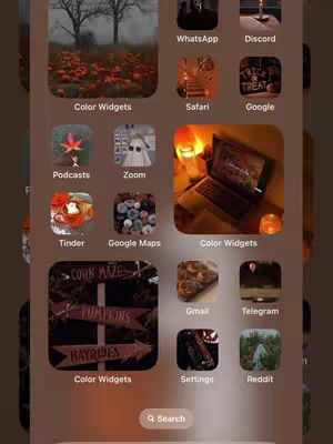 A phone screen displaying a custom aesthetic, with themed iPhone app icons arranged in a grid and widgets against a warm brown and orange background, suggestive of fall season.