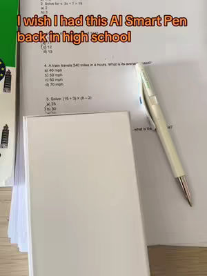 An image of a white pen placed on a piece of paper with math problems, with a whiteboard behind it. At the top, overlay text saying 'I wish I had this AI Smart Pen back in high school'.
