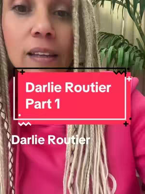 A woman with blonde dreadlocks is centered in the frame, wearing a pink hoodie. A red rectangle with white text overlays her chest, and the text "Darlie Routier Part 1" and "Darlie Routier" appear below it.