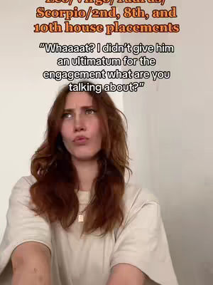 A woman with long reddish-brown hair is shown close-up, looking upwards with a quizzical expression. Text overlays at the top and in the middle provide context, with a neutral background.