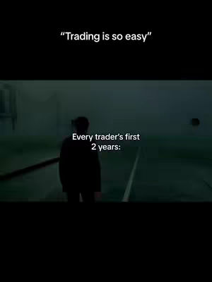 The image features a dark, moody scene with a person standing in the middle of a long hallway. The person is seen from the back, and there is white linear mark on the floor and on the walls. Overlayed text at the top in white reads "Trading is so easy". At the bottom text in white reads "Every trader's first 2 years:"