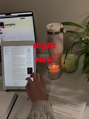 The image shows a study setup with a laptop, tablet, water bottle, candle, and papers. The text overlay reads 'Right Now'. The layout is a mix of tech and cozy aesthetic, setting a work and relaxation environment.
