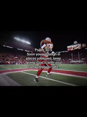 A mascot in a stadium at night with quote text.