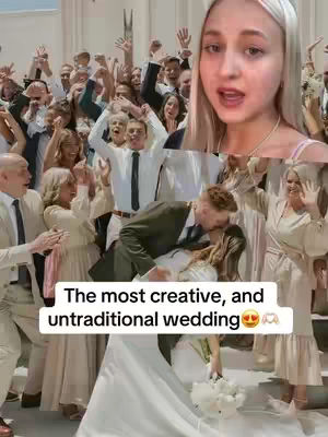 The original image captures a wedding scene. A woman with blonde hair and a white headband is in the top-right corner, with her mouth open as if speaking or singing. The background is filled with members of a wedding party, including people raising their hands. In the lower section is a couple kissing, the groom in a dark suit, and the bride in a white gown. Text in a white box at the bottom reads, 'The most creative, and untraditional wedding', with heart-eyes and hands-up emojis. The overall tone is celebratory and joyous, with a bright, outdoor setting.