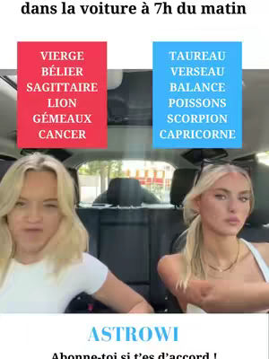 The image shows two young women inside a car, likely in the morning. They're positioned on either side of the frame, and the background indicates they're in the front seats. Above them are two colored boxes: a red one labeled with astrological signs like Vierge, and a blue one with signs like Taureau. The image is framed in a way that highlights the contrast between the two women, possibly representing the different zodiac traits. Below, the AstroWi brand is printed, and also an invitation to subscribe if the viewer agrees with the content. The car's interior and the women's expressions add to the context, enhancing the theme.