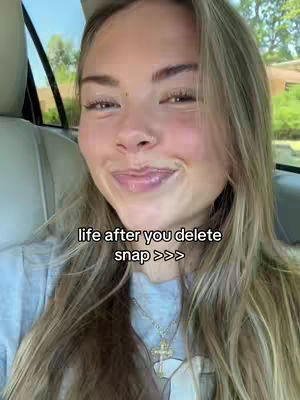 A selfie-style shot features a young woman in a car from the chest up. She has long blonde hair and is looking at the camera with a subtle smile. Her skin appears smooth, and she's wearing a necklace with a cross pendant. The lighting suggests the shot was taken during the day. Overlayed text at the bottom reads 'life after you delete snap >>>'.