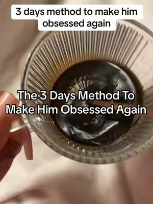 The cover image shows a close-up of a clear glass cup filled with a dark liquid, presumably coffee or a similar beverage. The liquid has a reflective surface with some slight swirling visible. The cup is held in a hand with visible painted nails. Overlayed text appears in two lines at the top: '3 days method to make him' and 'obsessed again'. Below, there is a larger, blocky outlined text: 'The 3 Days Method To Make Him Obsessed Again.' The background is blurred, featuring neutral tones.