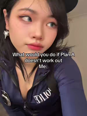 A woman in a police-style costume is the focus of the image. She is looking towards the side with a thoughtful expression. Overlayed text in white on the image asks, "What would you do if Plan A doesn't work out Me:"