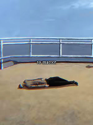The image shows a person lying on a surface that appears to be a deck or a rooftop with a metal railing in the background and a clear, blue sky. The person is dressed in a suit, with part of their body in shadow, suggesting a possible play on the light and perspective. Floating in the image is a text overlay reading 'to matter'.
