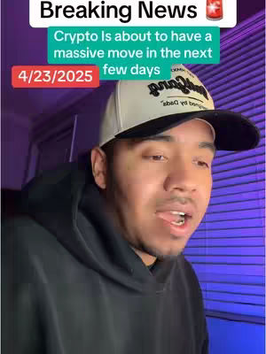 A man in a black hoodie and a baseball cap is talking to the camera. Overlay text proclaims 'Breaking News!', with additional text boxes indicating the date (4/23/2025) and a headline about a massive crypto move. The background is a purple hue, likely from lighting.