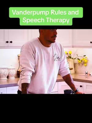 The cover image shows a man in a light-colored sweatshirt standing in a kitchen setting. Above him is a green banner with white text. The background includes white cabinets and countertops. The man has a watch on his wrist and is looking off to the side. There are decorative items near the flowers.