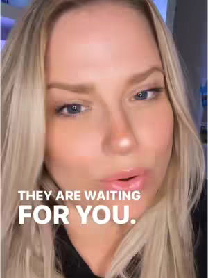 A close-up shot of a woman with blonde hair and fair skin. She has blue eyes, and her lips are slightly parted. Text overlays in white lettering at the bottom of the image.