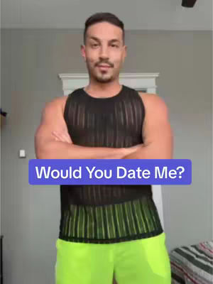 A man is standing, arms crossed, wearing a black mesh tank top and bright green shorts. A text overlay in a purple box asks, "Would You Date Me?"