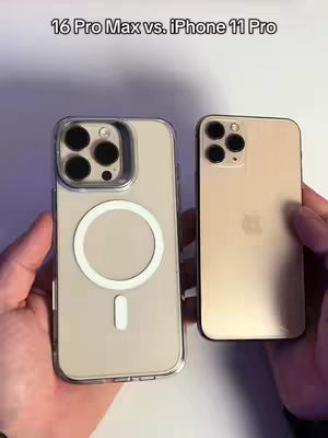 The image shows two smartphones held side-by-side against a plain background. The phone on the left is larger and silver, sporting a protective case, and a visible white MagSafe circle. The phone on the right, is smaller and gold-colored.