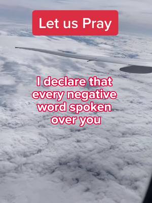 The image shows a view from an airplane, with the wing visible on the right side and clouds filling the rest of the frame. The sky is light blue. Text overlays, in a bold and colorful font, are added on top of the image.