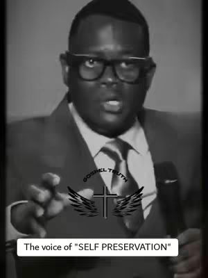 A black and white image of a man centered, wearing glasses and a suit, with text overlayed at the bottom.