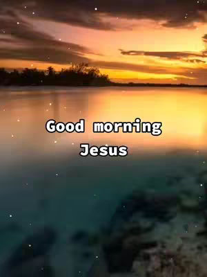 The image shows a serene landscape at dawn or dusk, with a body of water reflecting the colorful sky and clouds. The words 'Good morning Jesus' are overlaid in a white, bold font.