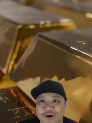The cover image shows a man with a black cap in front of a background of golden bars.