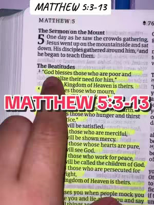 A close-up shot of a Bible open to Matthew 5:3-13 with text highlighted in yellow. A hand is pointing to the highlighted text with red text overlays.