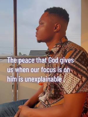 The cover image shows a man from the chest up, seated near a window with a view of a cloudy sky. He gazes off to the side, appearing contemplative. Text overlayed on the image reads: "The peace that God gives us when our focus is on him is unexplainable."