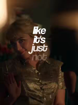 A woman with blonde hair smiles, wearing a gold button-down shirt, with text overlayed on the image.