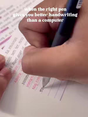 Close-up shot of a hand writing on a white page with a pen. The page has text highlighted in pink and pre-printed lines with more text. The hand is holding a dark pen and writing with the nib pointed down. Text overlayed in the image appears in the top with white color saying: "when the right pen gives you better handwriting than a computer"