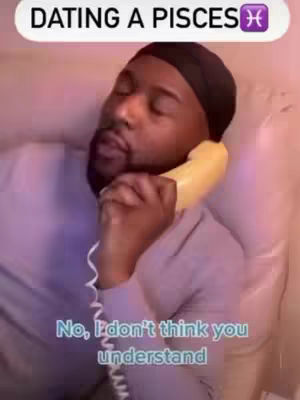 The cover image features a man on the phone, seemingly in bed. The text overlayed on the image reads 'DATING A PISCES' in a white text bubble, accompanied by the Pisces zodiac symbol. Below the image, the text 'No, I don't think you understand' is overlaid in a light teal color. The man has dark hair, a beard, and is wearing a black durag and a light purple long-sleeved shirt.