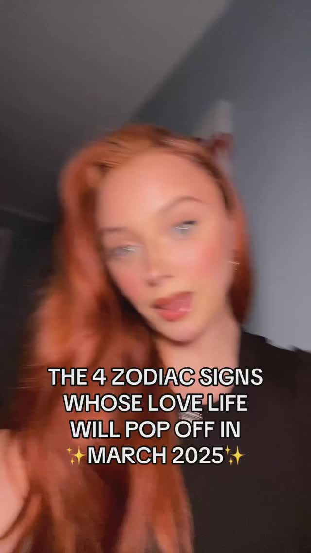 A selfie-style shot featuring a fair-skinned woman with vibrant red hair, blue eyes, and a slightly open mouth. The text overlay is bold, and placed below the subject's face. The background appears blurred, suggesting a shallow depth of field, and the lighting is soft, possibly augmented by filters or soft lighting.