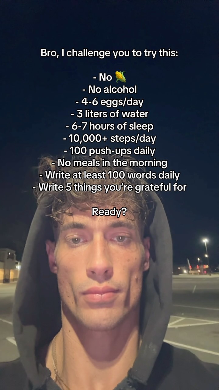 A selfie-style shot of a man in a hoodie looking directly at the camera. Text overlaid on top lists a series of challenges related to lifestyle choices such as diet and exercise.
