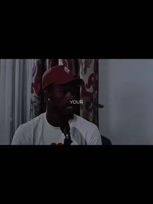 A man wearing a red cap and white shirt, centered in the frame with the word, "YOUR" overlaid on his chest.