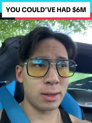A man wearing glasses is sitting inside a car, the top of the car is open and the background is a blurry image of trees. Text overlay at the top says 'YOU COULD'VE HAD $6M'