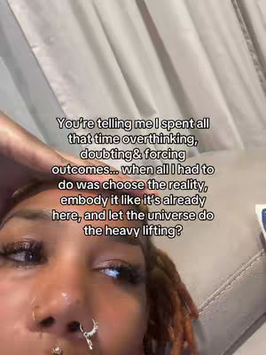 The cover image is a selfie-style shot of a person appearing to be deep in thought, with overlaid text. The person's face is the primary focus, and they have multiple piercings. The background includes a soft, neutral-toned surface, possibly a couch or bed covering, with the top of the head and hand of another person only partially visible.