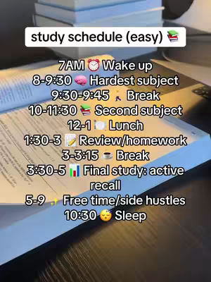 The image shows an open notebook with a study schedule written on the pages, along with a stack of books in the background. The page shows study times with subject and activity breakdowns, featuring colorful icons to represent each part of the schedule. The overall composition is well-lit with a focus on studying.