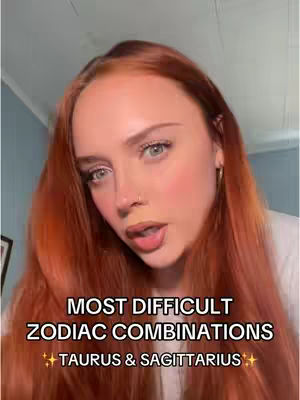 A young woman with long auburn hair gazes directly at the camera with a slight pout. Text overlays the image, declaring "MOST DIFFICULT ZODIAC COMBINATIONS" and listing "TAURUS & SAGITTARIUS". The background suggests an indoor setting with a blue wall visible.