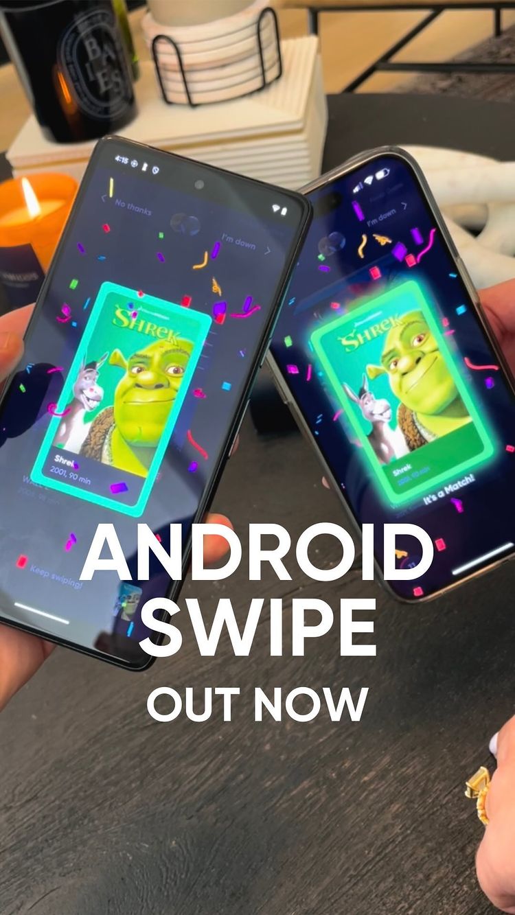 The image shows two smartphones side-by-side, each displaying a Shrek movie card on their screens. The phones are held by hands, and there's a table setting and candle in the background. The overlay text is in white, in a sans-serif font.