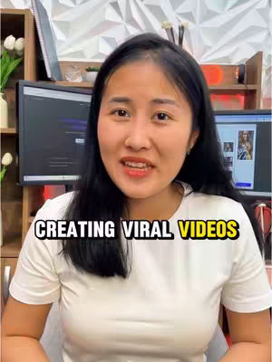 A woman with long black hair smiles at the camera, set against a background with computer monitors and a textured wall. The text overlay reads 'CREATING VIRAL VIDEOS'.